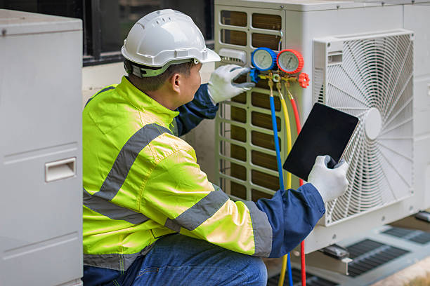 Professional Air Duct Cleaning technician working in Bradenton Beach, FL